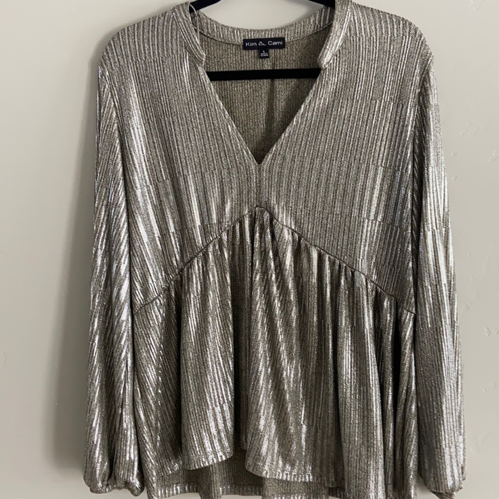 Silver sparkle long sleeve peplum top
